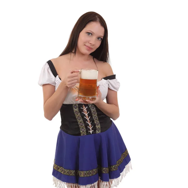 Young woman in traditional bavarian dress holding mug of beer. — Stock Photo, Image