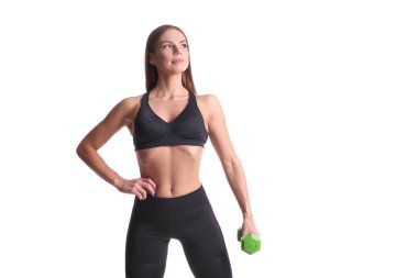 dumbell ile çalışma dışarı sportif kaslı kadın