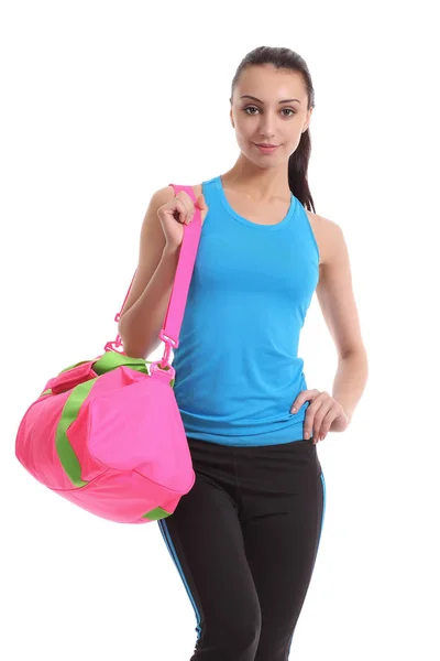 Подходит молодая женщина с спортивной сумкой — стоковое фото