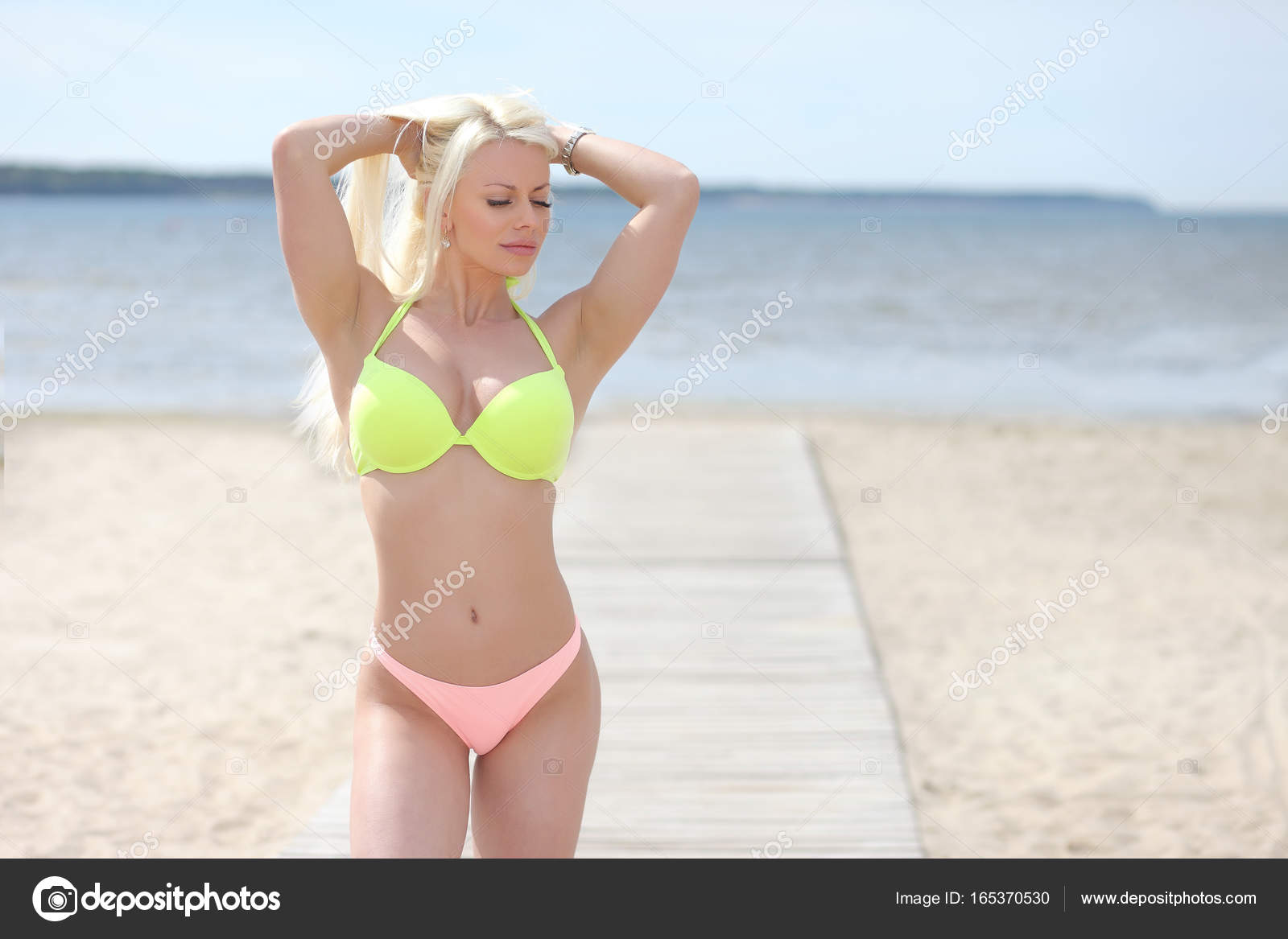 girl in a white T-shirt with big breasts Stock Photo