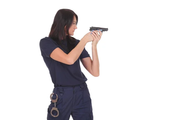 Young police girl with gun — Stock Photo, Image