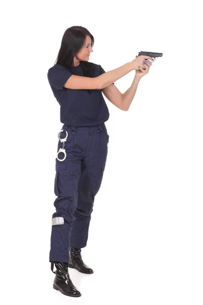 Jeune fille de police avec arme à feu — Photo