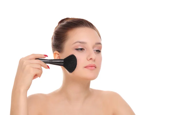 Woman applying dry cosmetic powder — Stock Photo, Image