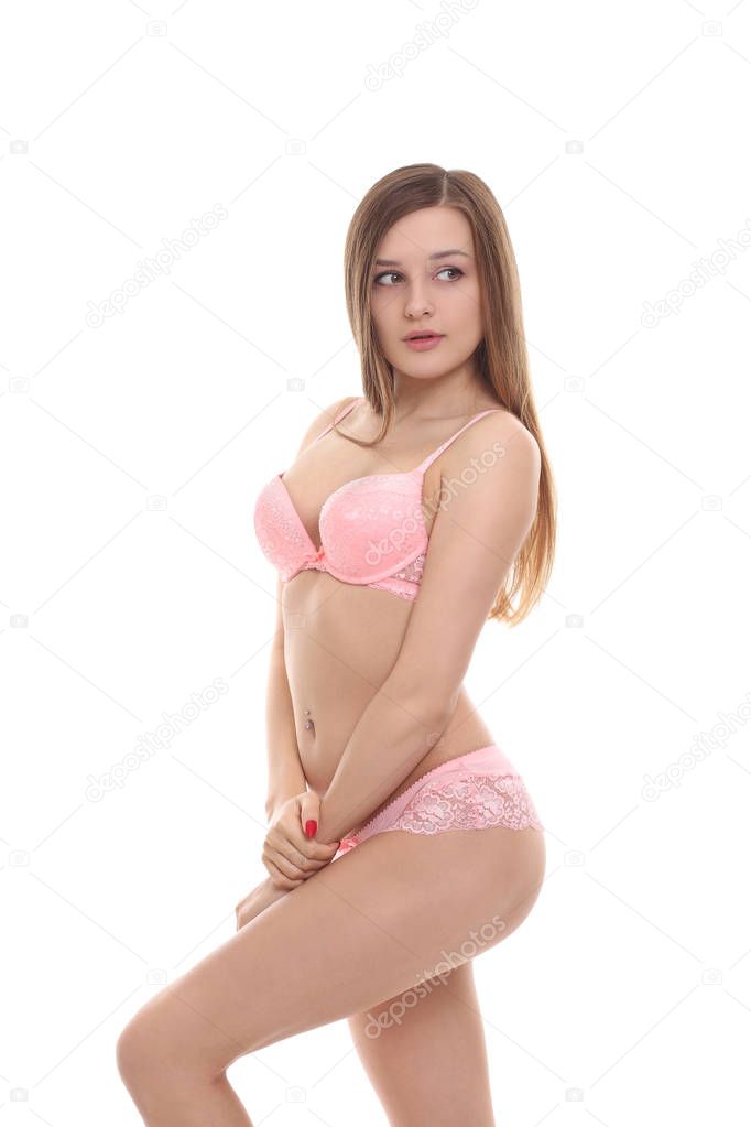 sexy female body in pink underwear on a white background