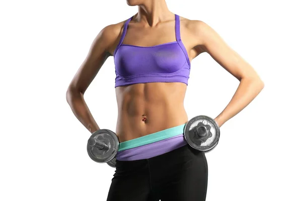 Slim muscular girl with dumbbells — Stock Photo, Image