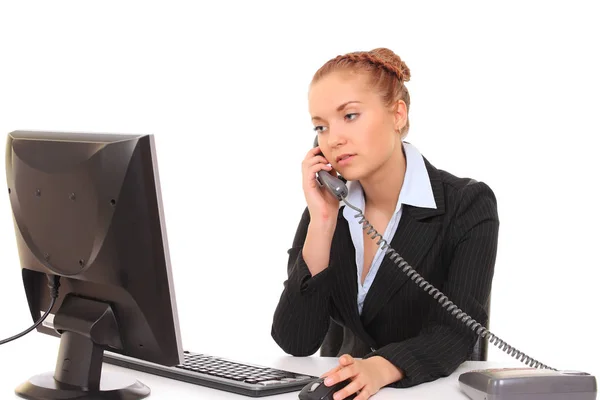 Young girl sitting at the table — Stock Photo, Image