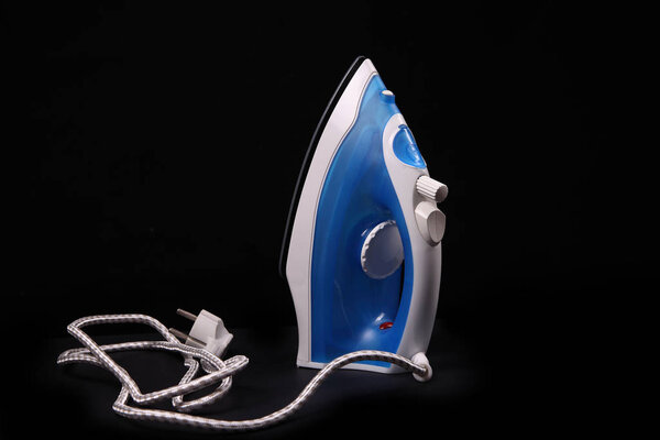 white blue iron on black background