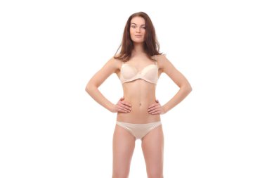 kadın bir ince rakam beyaz iç çamaşırı ile