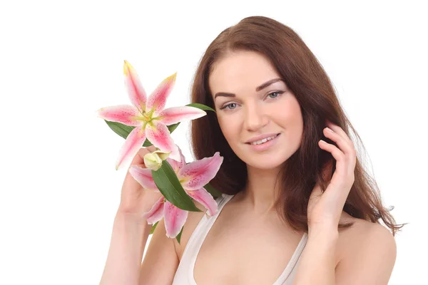 Cara de belleza de mujer con flor de lirio — Foto de Stock