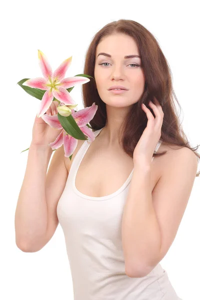 Cara de belleza de mujer con flor de lirio —  Fotos de Stock
