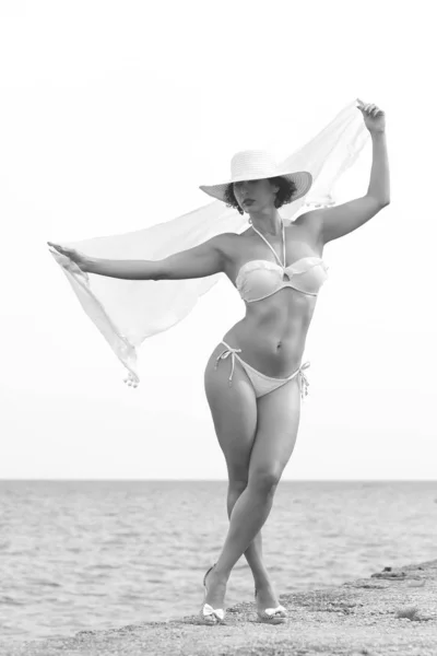 Young woman in a white swimsuit — Stock Photo, Image