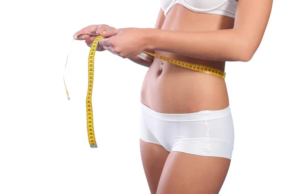 Woman measuring her slim body — Stock Photo, Image