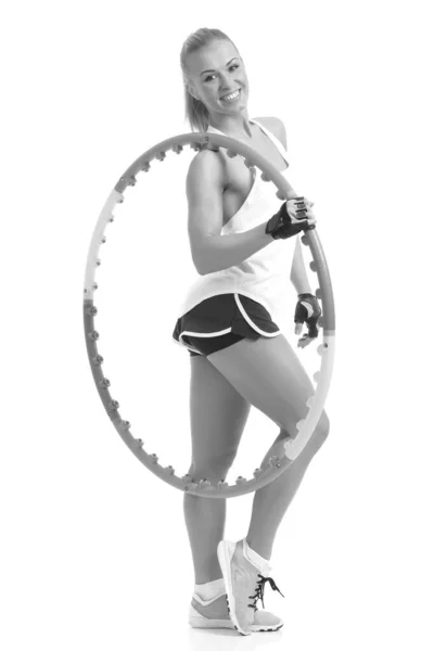在白色背景上的呼啦圈运动的年轻女子 — 图库照片