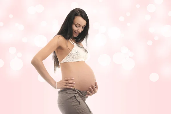 Feliz Joven Embarazada Sobre Fondo Abstracto —  Fotos de Stock