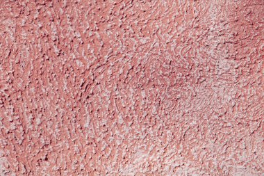 Doku - Pembe smoothie. Tek bir duvarın dokusu. Macun kaotik dalgalarda yatıyordu. Macun çıkıntıları beyaza boyanır..