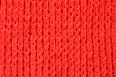 Kırmızı örülmüş yün arka plan. Lastik bant bağlayıcı dokuyu bir ön tarafı yanlış