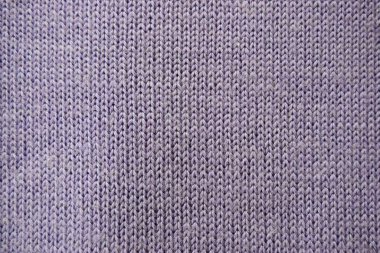 Leylak renginde yün örülmüş arka plan. Yüz bağlayıcı doku