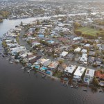 Aerial view of buildings along river