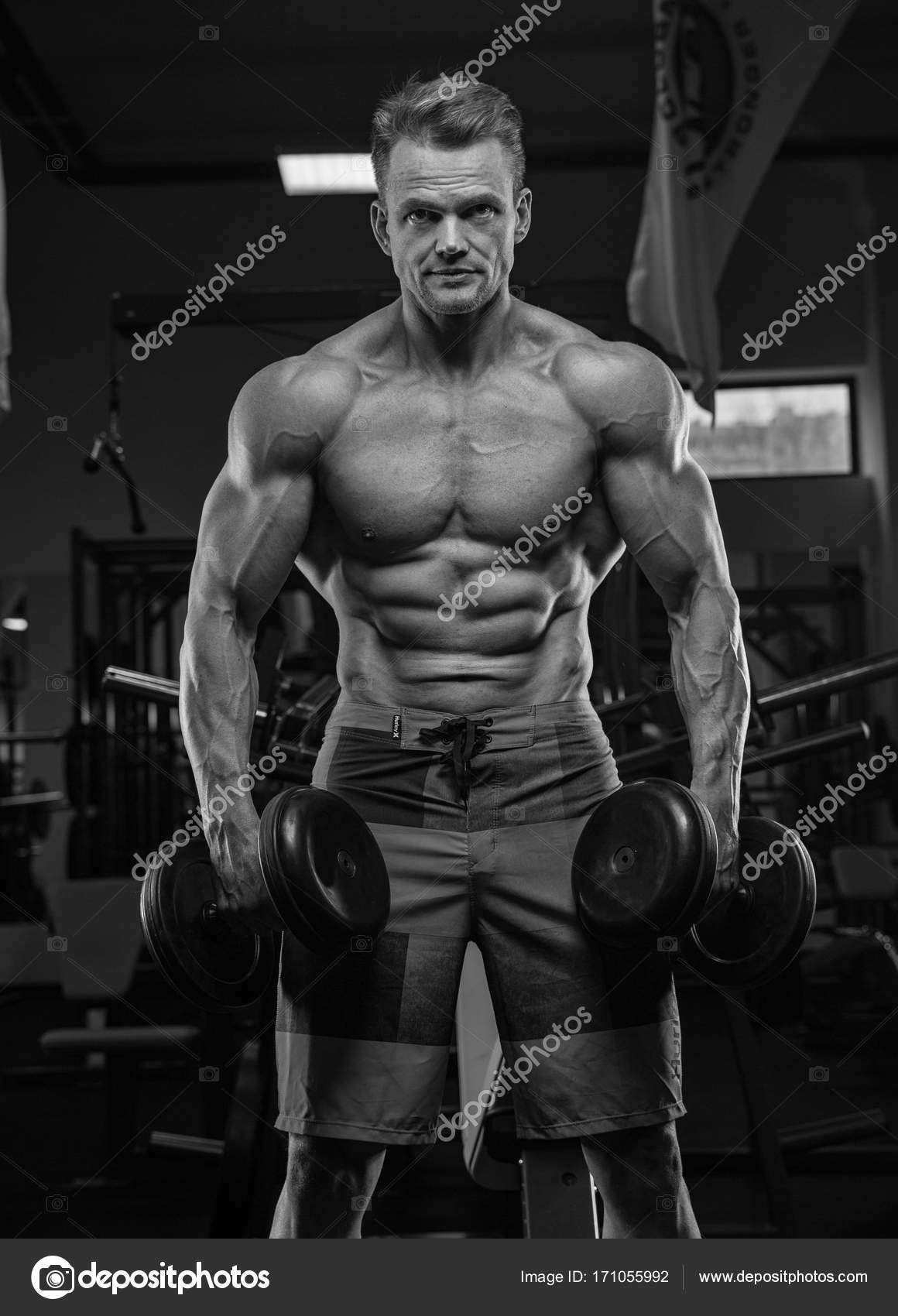 Brutal Strong Athletic Men Pumping Up Muscles Workout Bodybuildi Stock Photo C Roman L Olegovic