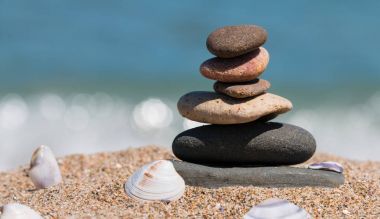 Stack of stones on beach clipart