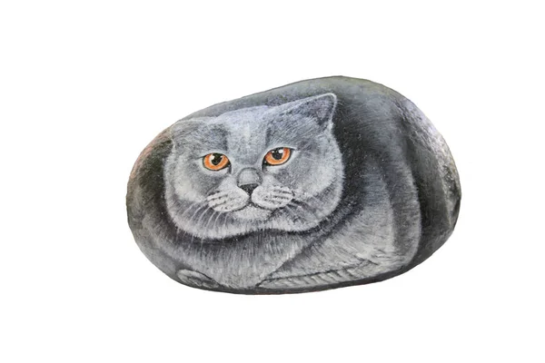 Statuette of a cat made of granite on a white background.