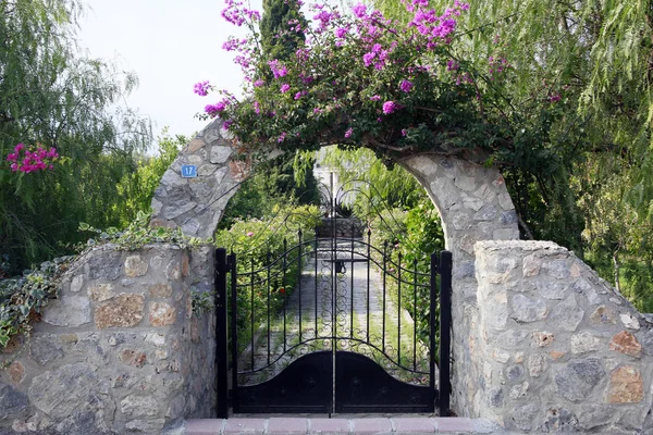 Garden gate under an archway