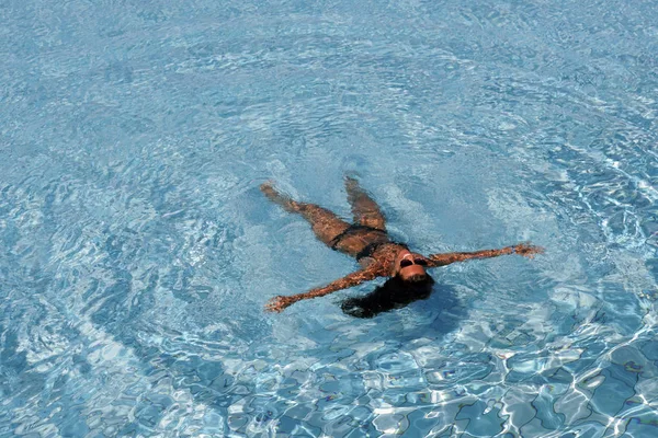 Young woman in bikini on water, El Quseir, Egypt