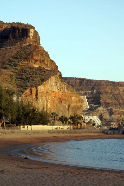 Evening mood on the deserted beach, in the background the Cruz de Piedra, Puerto de Mogan, Gran Canaria, Canary Islands, Spain