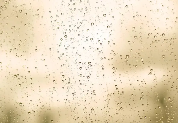 Gouttes d'eau de pluie sur un fond de surface en verre, Résumé Backdro — Photo