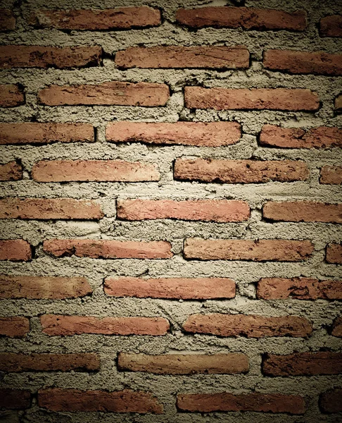 Textura de pared de ladrillo viejo en una imagen de fondo — Foto de Stock