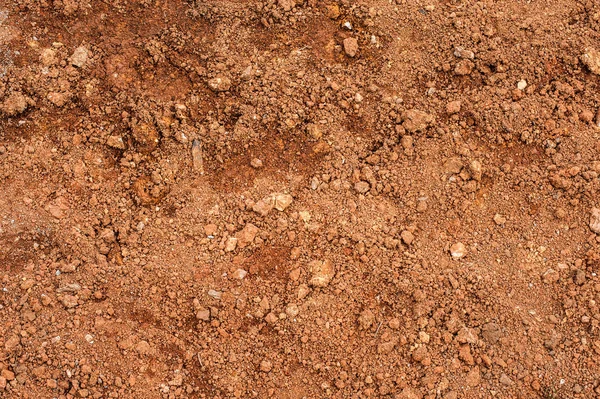 Тропічний латинітовий грунт або фон червоної землі. Червоні марсоходи — стокове фото