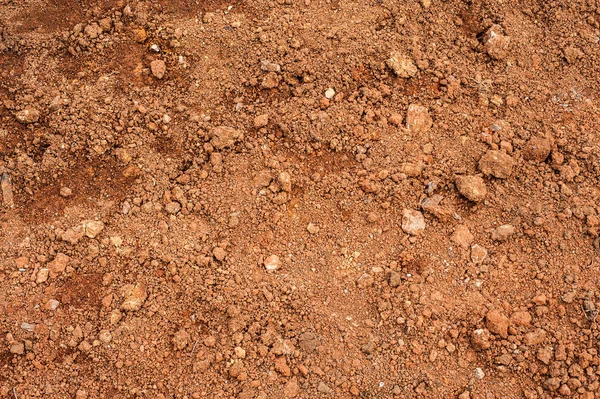 Tropischen Lateritboden oder rote Erde Hintergrund. roter Mars nahtlos — Stockfoto