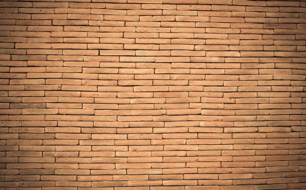 Textura de parede de tijolo velho em um fundo — Fotografia de Stock