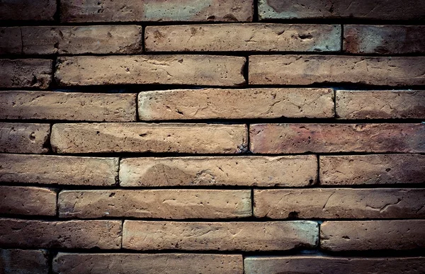 Textura de pared de ladrillo viejo en un fondo — Foto de Stock