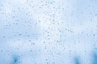 Bir cam yüzey arka planda, zemin yağmur suyu damla