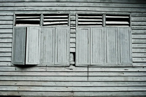 dark windows in old haunted house, abstract retro