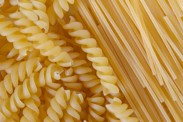 Peynirli makarna. Kusursuz bir yemek dokusu. Bu dokuyu kumaş ve malzeme baskıları, resim arkaplanları, posterler ve menüler, davetiyeler, kolaj, hediye paketi, duvar kağıdı, yazı dizaynı içinde vb..