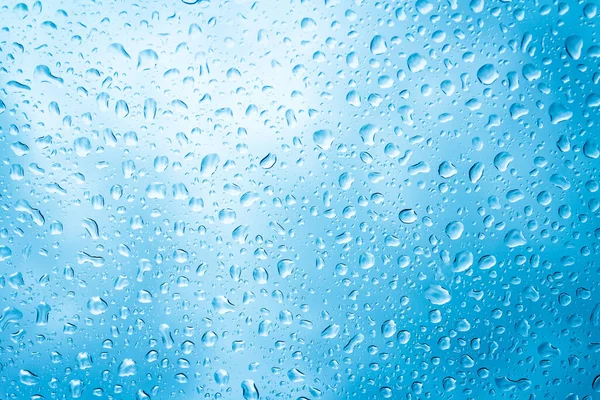 Gotas Agua Azul Sobre Vidrio Fondo Gota Lluvia —  Fotos de Stock