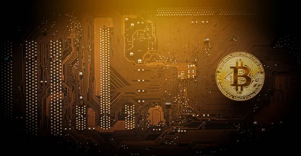 Ticaret grafiği, madencilik ve ticaret bitcoin kavramına sahip bilgisayar ana tahtasındaki altın bitcoin. 