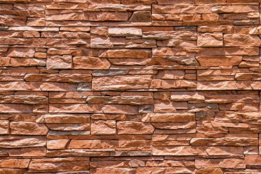 Kahverengi kum tuğlası duvar veya taş duvar dokusu ve arkaplanı