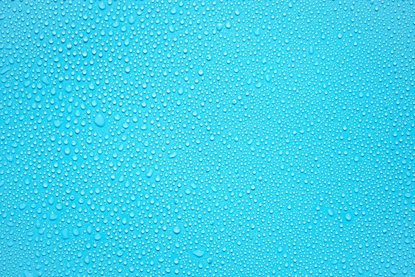 Gotas Agua Gotas Lluvia Sobre Fondo Lámina Plástico Azul — Foto de Stock