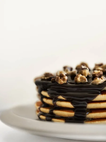 Pancakes Dressing Chocolate Nuts White Plate White Background — Stock Photo, Image