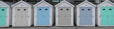 Beach huts in Lyme Regis clipart