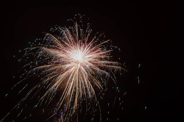 Long exposure of fireworks in the sky.