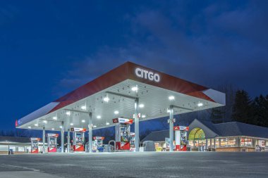 New Hartford, New York - Apr 1, 2020: Citgo Gas Station Exterior, Citgo Petroleum Corporation is a US-based Refiner, Transporter and Marketer of Transportation Fuels, Lubricants, Petrochemicals. clipart