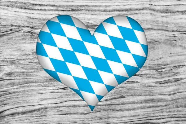 Bayerisches Herz vor hölzernem Hintergrund — Stockfoto