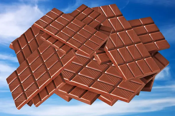 Chocolate on blue sky background — Stockfoto