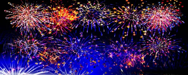 Night fireworks with blue and black sky — Stock Photo, Image