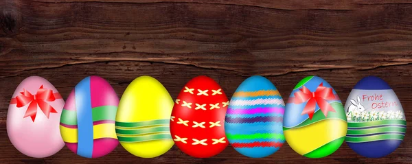 Colourful Easter egg with pattern banner on wooden background