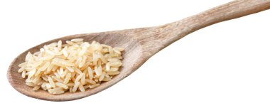 Tam tahıllı pirinç ve tahta kaşık.